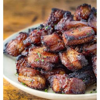 1/2kg roasted pork, cassava & kachumbari