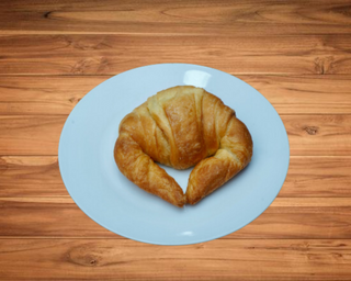 Cruasán con mantequilla
