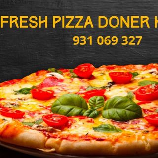 Pizza de pollo .champi. jamón dulce. oliva 