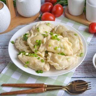 Вареники з солоним сиром та кропом (230/20г)