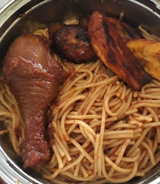 Spaghetti , plantain and chicken