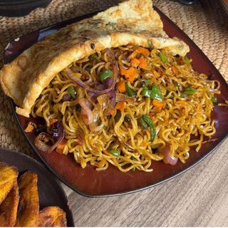 Noodles and fried egg