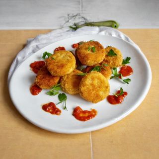 Delícies de formatge de cabra arrebossat