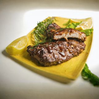 Costata di maiale in salsa bbq e patate