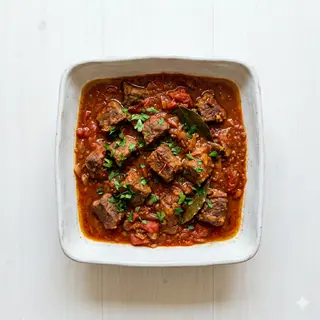 Carne Con Tomate