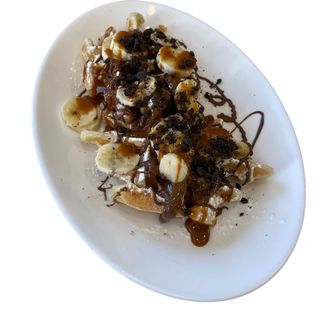 Gofre 18: Nutella, dulce de leche, plátano, crujiente de galleta Oreo
