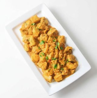 Piept de curcan curry oriental cu cartofi cu unt