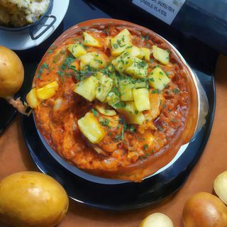 Pollo en salsa de tomate