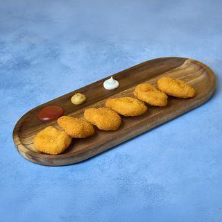 Pileći nuggetsi 6 komada, pomfrit i sosovi po izboru