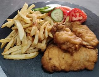 Meniu Snitel cu cartofi copti