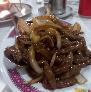 Ternera Con Cebolla 