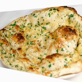 Naan de ajo     (  pan  de ajo )   pan indu