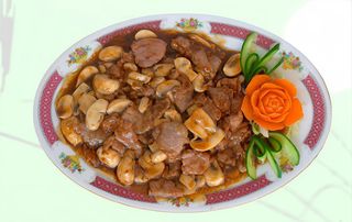 66. Ternera Con Champiñones