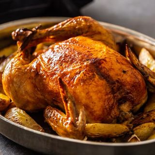 Pollo asado (1.3 kg.) con patatas panadera
