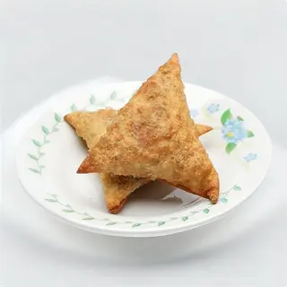A Pair Of Vegetable Samosas