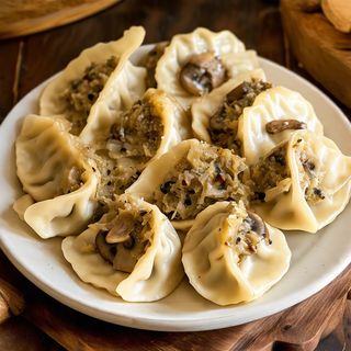 Pierogi z kapustą i grzybami leśnymi 24szt. z cebulką lub masłe