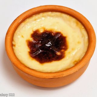 Мляко с ориз на фурна