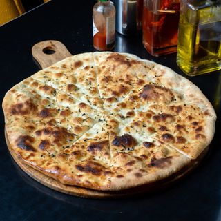 Pizza Focaccia + Boisson Coca au choix 