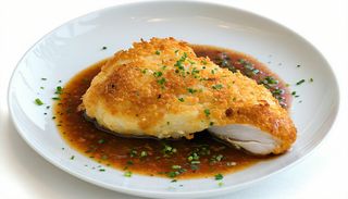 Piept de pui în crustă de cartofi