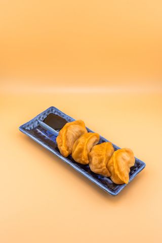 64 Ravioli a vapore con pollo 4 pezzi