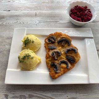 Kotlet schabowy 150g z pieczarkami