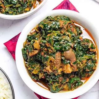 Efforiro CowLeg Plus: Efforiro + CowLeg + Beef + Kpomo + Pounded Yam 