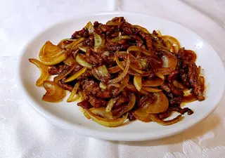 Ternera Con Cebolla