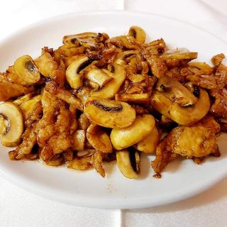 Cerdo Con Champiñones