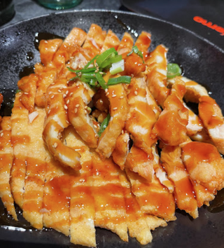 Pechuga De Pollo Rebozada Con Salsa Teriyaki