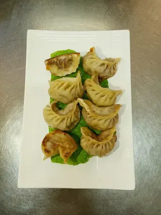 14. Ravioli alla piastra - 4 pezzi