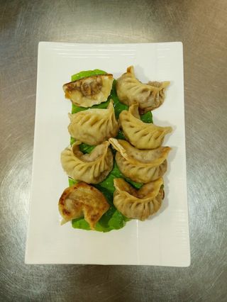 14. Ravioli alla piastra - 4 pezzi