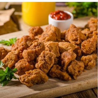 Popcorn de pollo  con salsa (12 uds.)