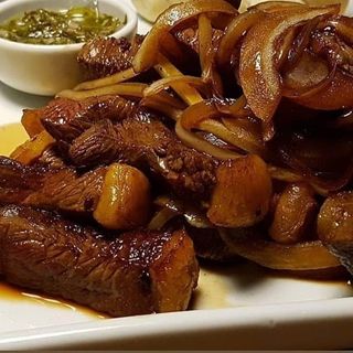 Porção de Picanha Acebolada