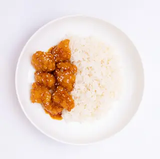 Куриные бедра в панировке с рисом