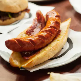 Pikantwurst con cebolla