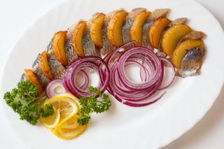 Оселедець з запеченою картоплею (150/120г)