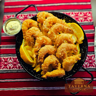 Creveti pane pe pat de cartofi