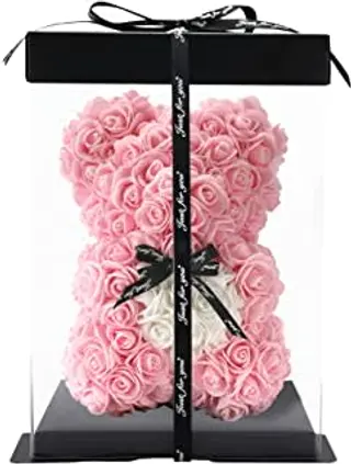Orso con fiori finti e cuore rosa