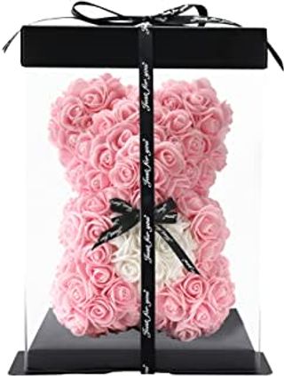 Orso con fiori finti e cuore rosa