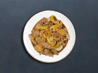 Cerdo Con Champiñones