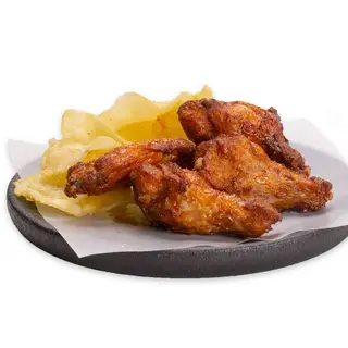Alette di pollo con salsa BBQ
