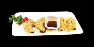 Ravioli saltati con carne - 4 pezzi