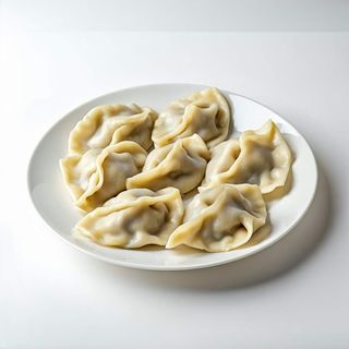 Pierogi z serem i ziemniakami, cebulką i szczypiorkiem