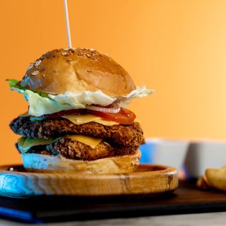 Burger Double Chicken Delight + Soda & Tenders