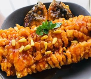 165. Lubina Con Piñones