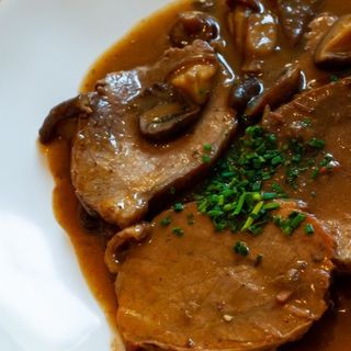 Ternera asada con Champiñones