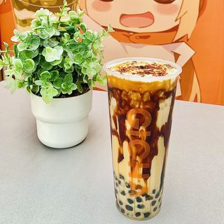 Te con leche y Azucar moreno