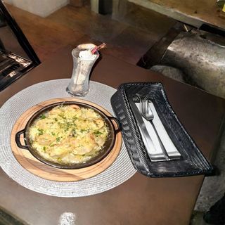 Пельмені запечені з грибами та затертим сиром