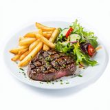 Lomo de cerdo, patatas fritas y ensalada