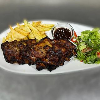 Coaste de porc în sos barbeque